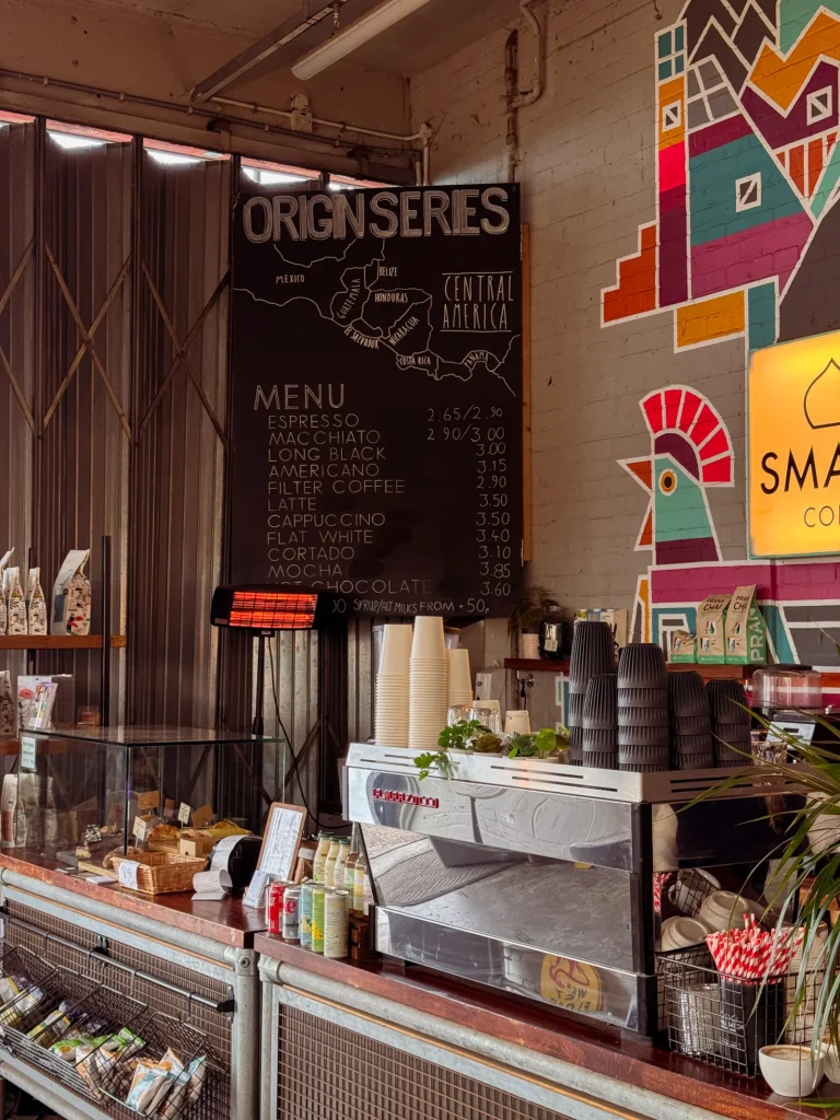 Coffee shop counter with espresso machine and menu